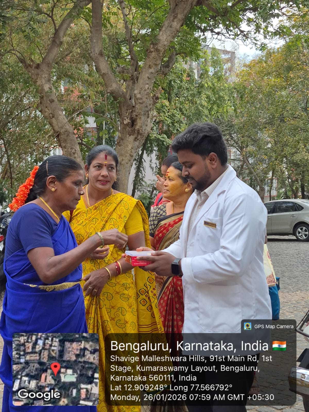 Distribution of sweets to attendees during Republic Day celebration