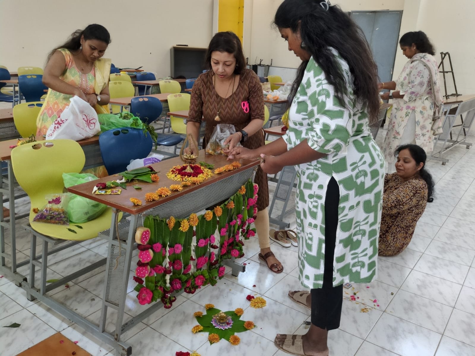 Participation by staff in Thorana making competition