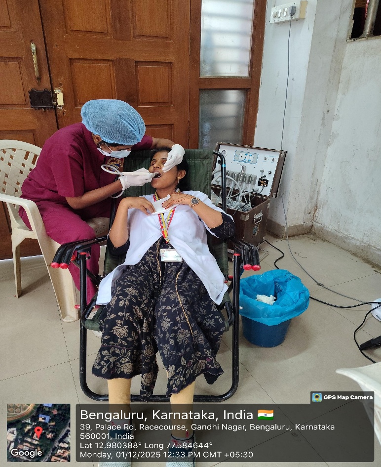 Dental treatment in progress inside a mobile dental unit
