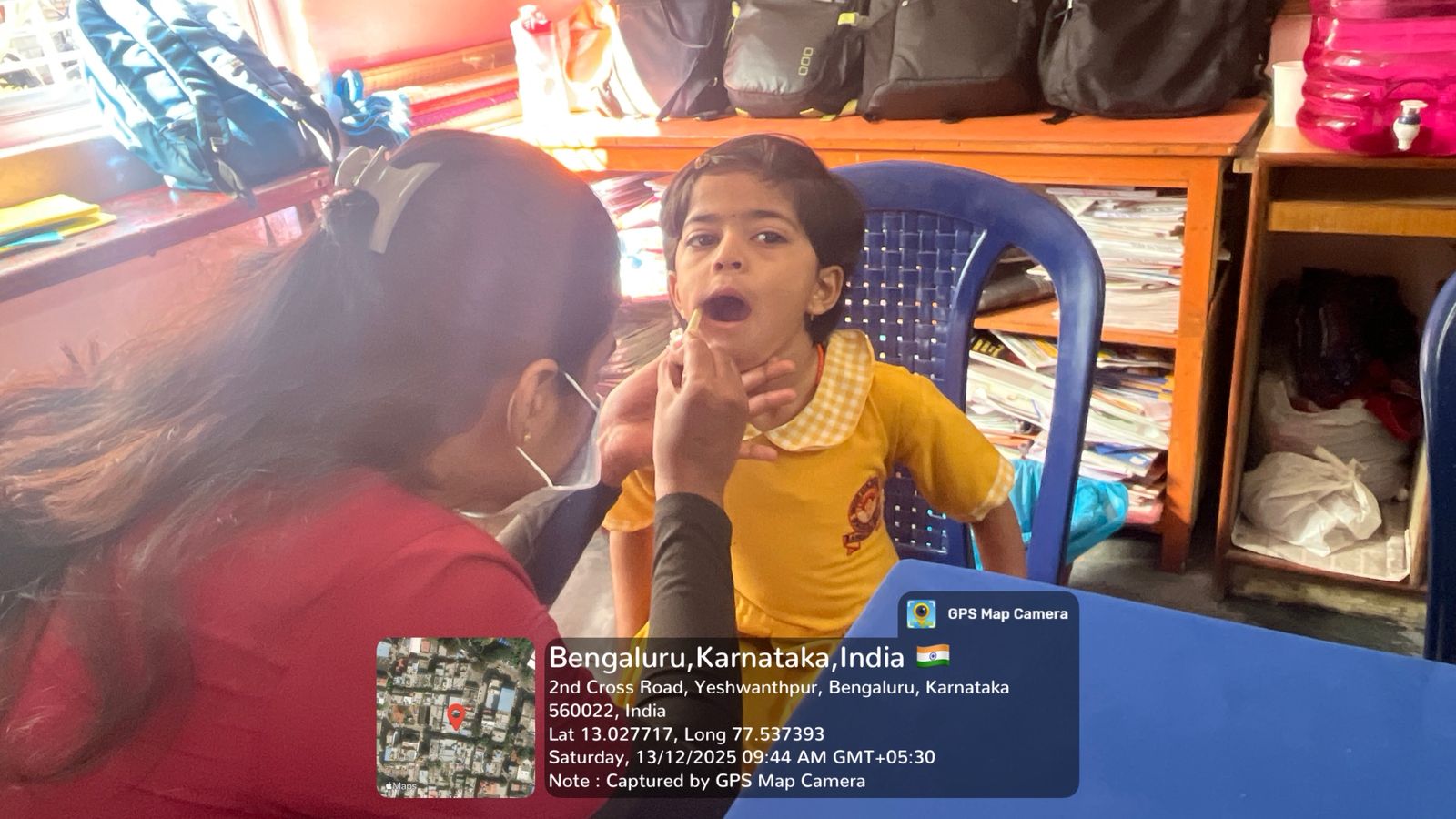 Dentist examining a child's teeth