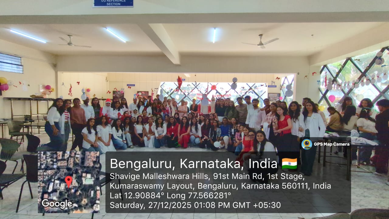 Large group photo of students and staff participating in the celebration