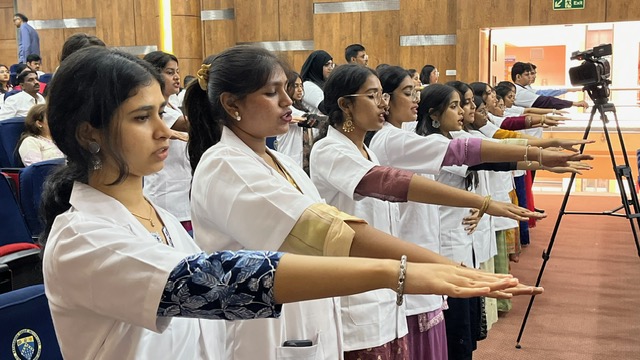 Students taking the Charak Shapath oath