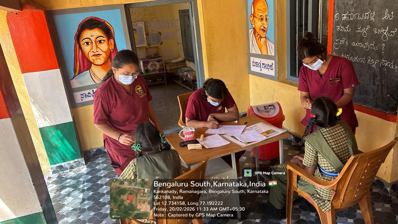 Dentist performing extraction on an elderly female patient