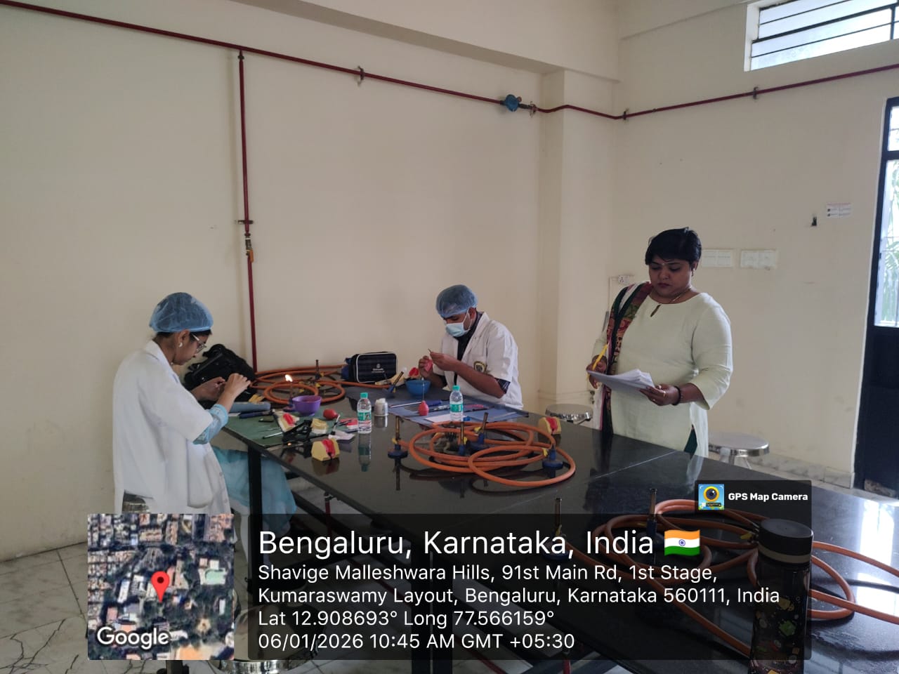 Participants and faculty posing with the Karnataka Skill Olympics 2025 banner