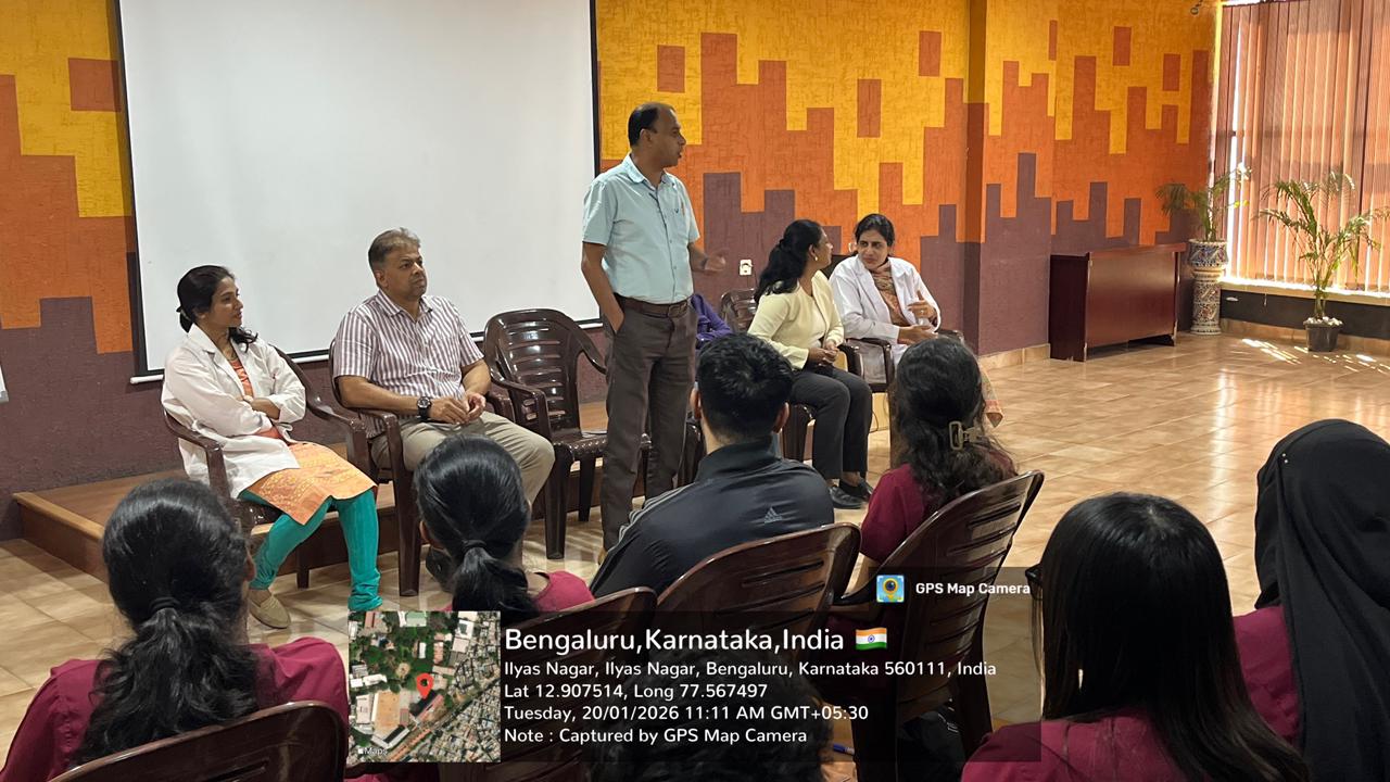 Vice Principal presenting a token of appreciation to the guest speaker