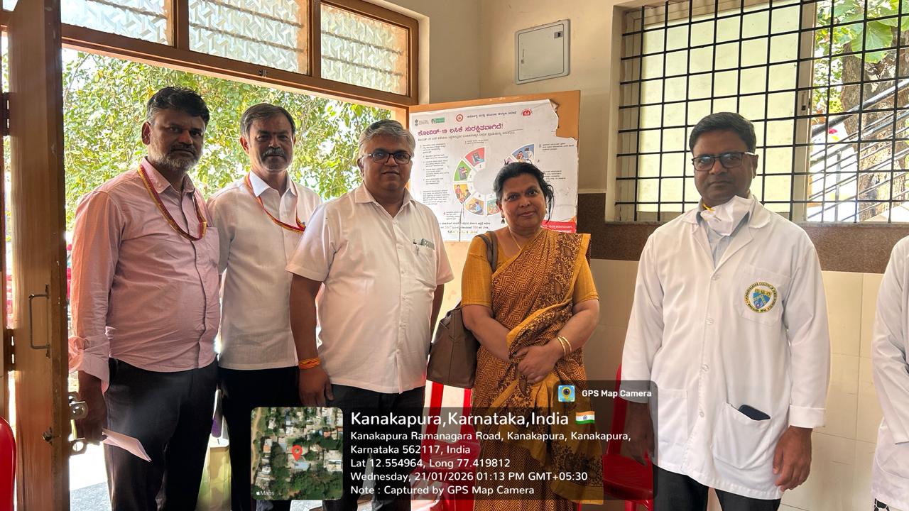 A dentist performing a dental examination on a patient at the camp.