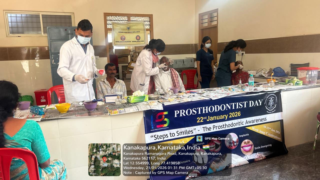 A dental professional taking an impression for a patient's denture.