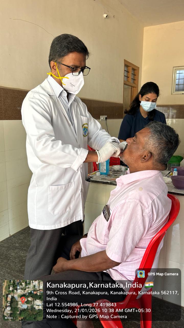 Dentists meticulously working on dental impressions and models.