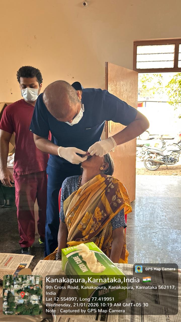 The dental team and patients gathered for a group photo at the Kanakpura camp.