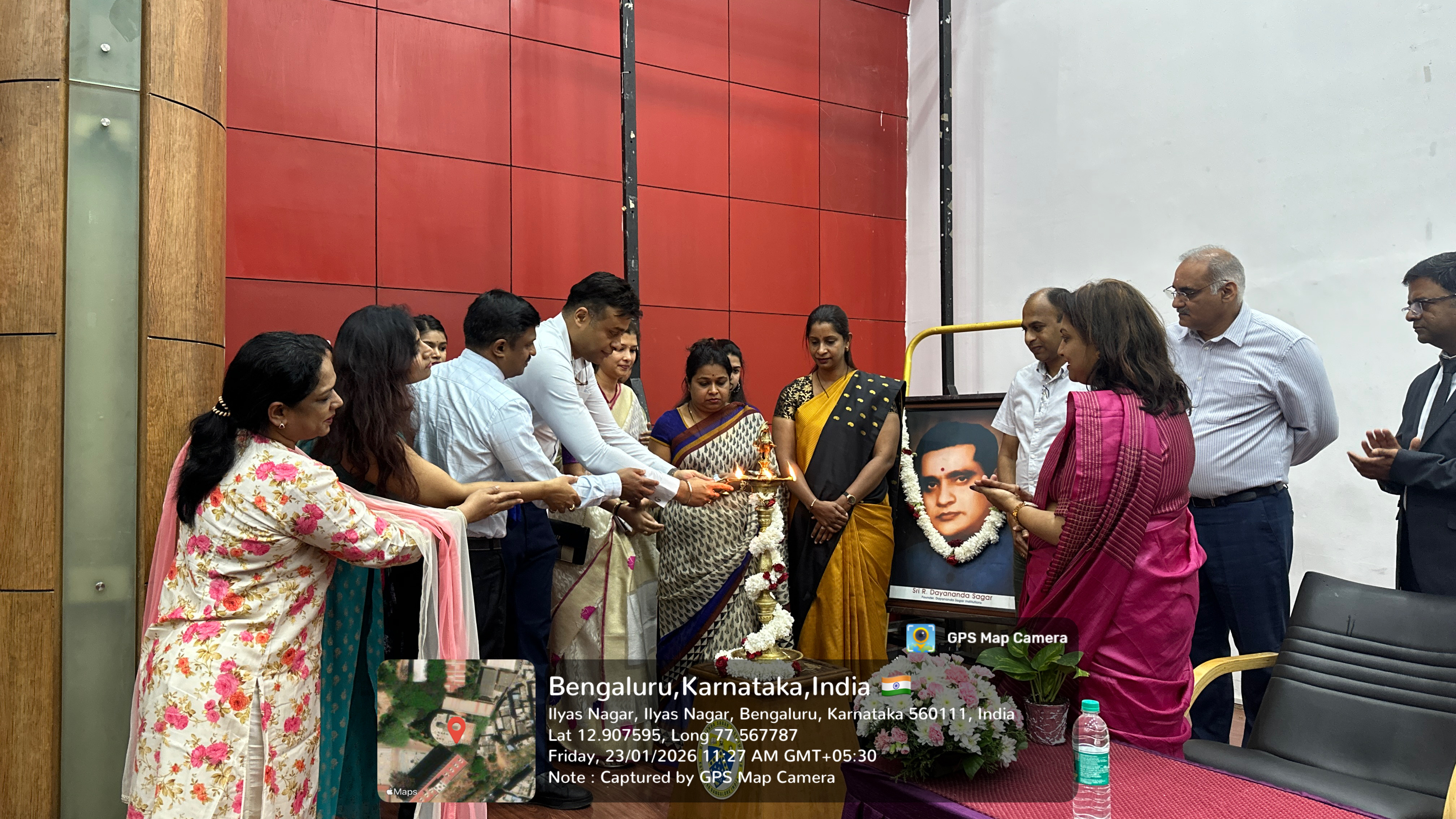 Dignitaries lighting the lamp to inaugurate the program
