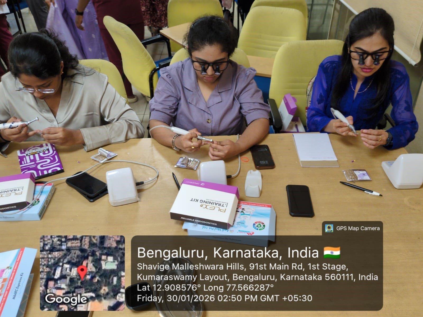 Students engaged in a hands-on activity with endodontic instruments