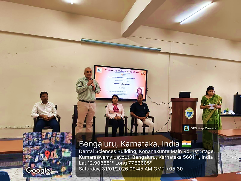 Dr. Hemanth M presenting a certificate of appreciation to Dr. Aparna Singhal